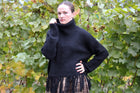 Coastline Fringe Hem Ribbed Turtleneck Sweater