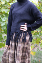 Coastline Fringe Hem Ribbed Turtleneck Sweater